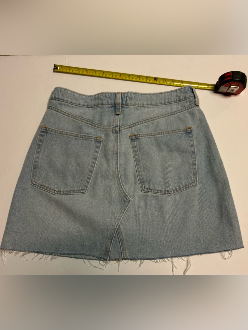 H&M Light Blue Denim Skirt with Contrast Stitching & button fly. Size 10